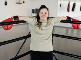 women standing in a boxing ring corner